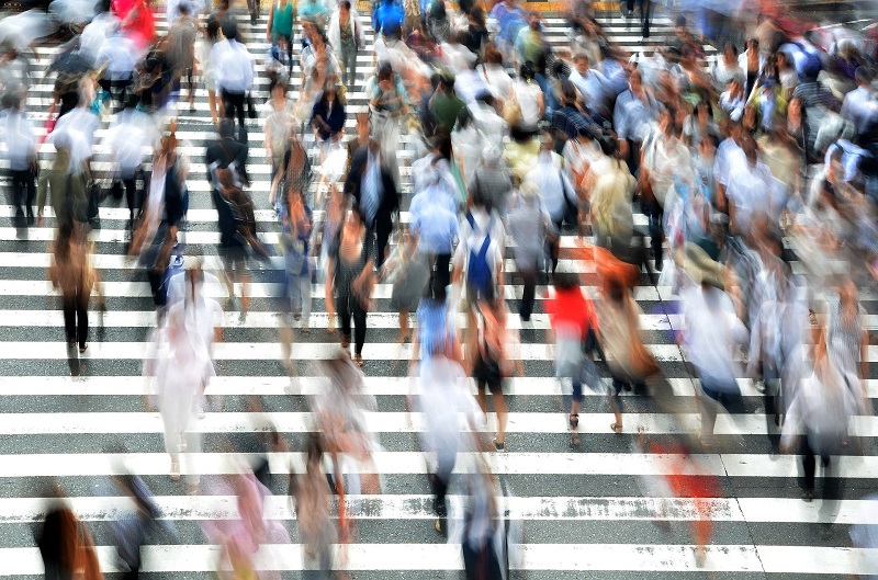 Safety Tips for Orange County Drivers Blurred Image of A Lot of People Crossing the Street